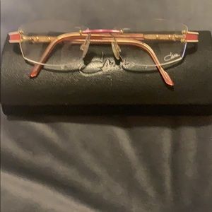 Cazal Pink and Gold Frame glasses.